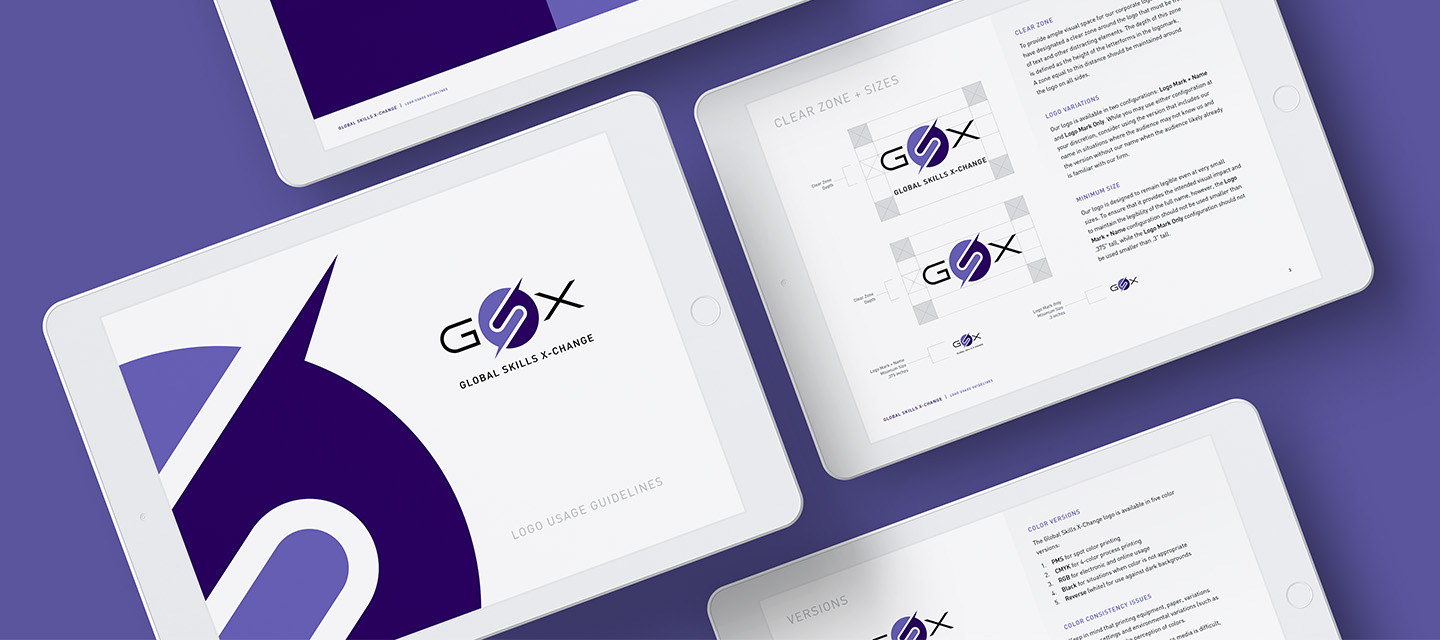 Four white tablets on a purple surface display marketing design branding guidelines for GSX, featuring the GSX logo, color specifications, and usage instructions. The main color theme is purple and white with bold graphic elements.